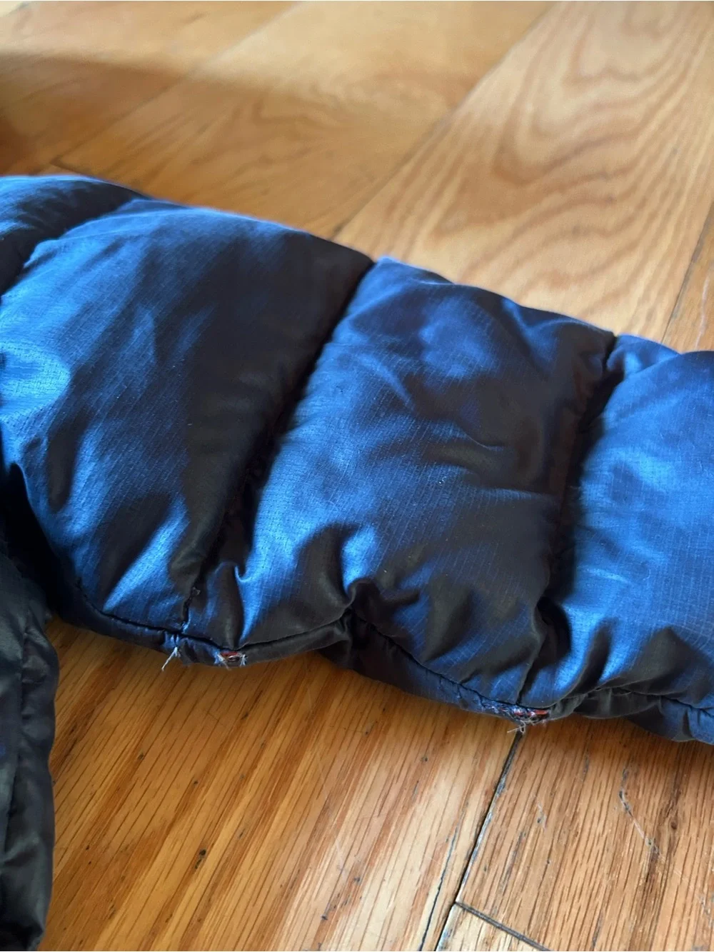 Patagonia Red Puffy Jacket with Multicolor Logo